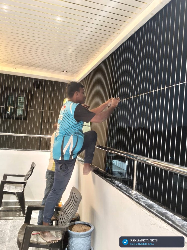 Certified In-House Technician Installing SS 316 Balcony Invisible Grill